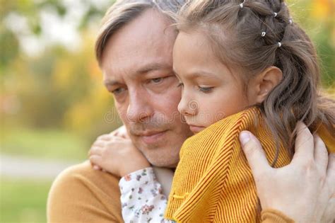 father and daughter hugging|father hugging his daughter.